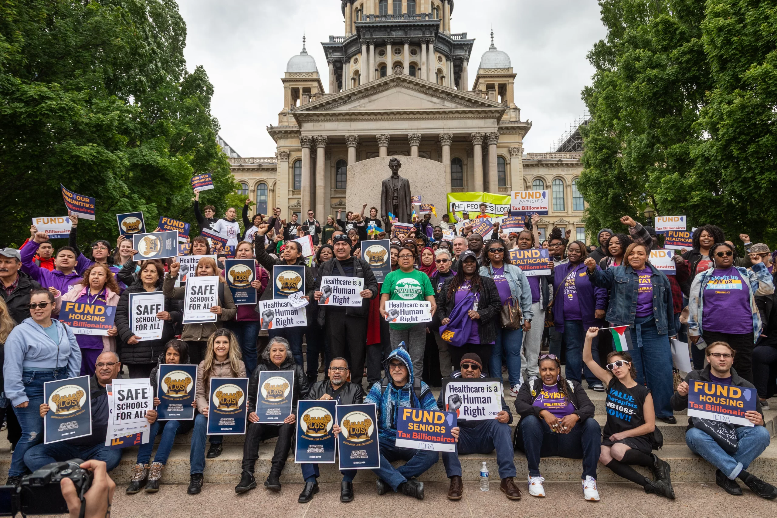 250+ members of the Illinois Revenue Alliance hold press conference outside the Illinois State Capitol.